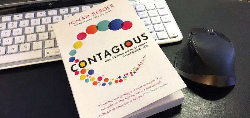 A photo of the book Contagious, one of the best growth hacking books